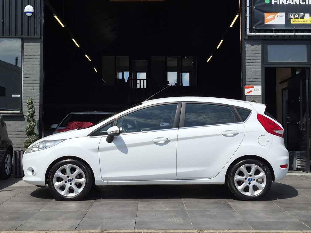 Ford Fiesta 1.25 Titanium|Cruise|Airco|Trekhaak|El.Ramen|PDC 55502321-0.jpg | Adequaat Auto's