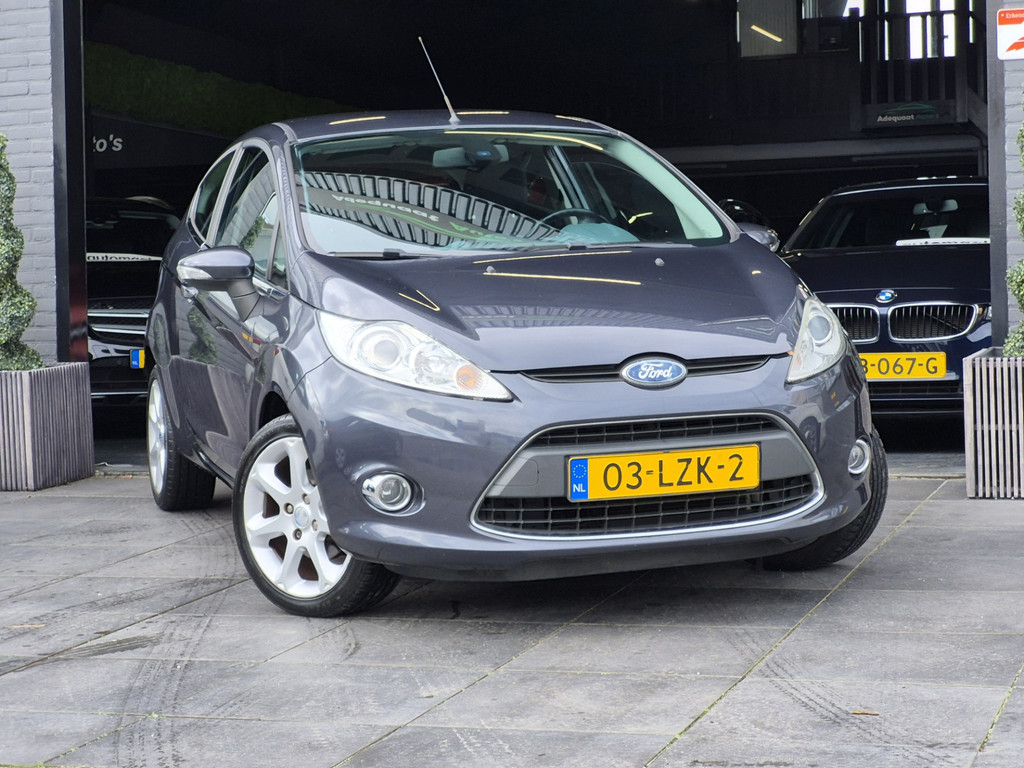 Ford Fiesta 1.25 Titanium|2e eig|NAP|Cruise|Airco|PDC|APK 57391289-0.jpg | Adequaat Auto's